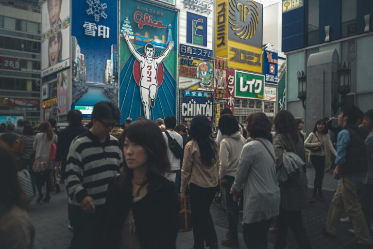 people walking on street during nighttime